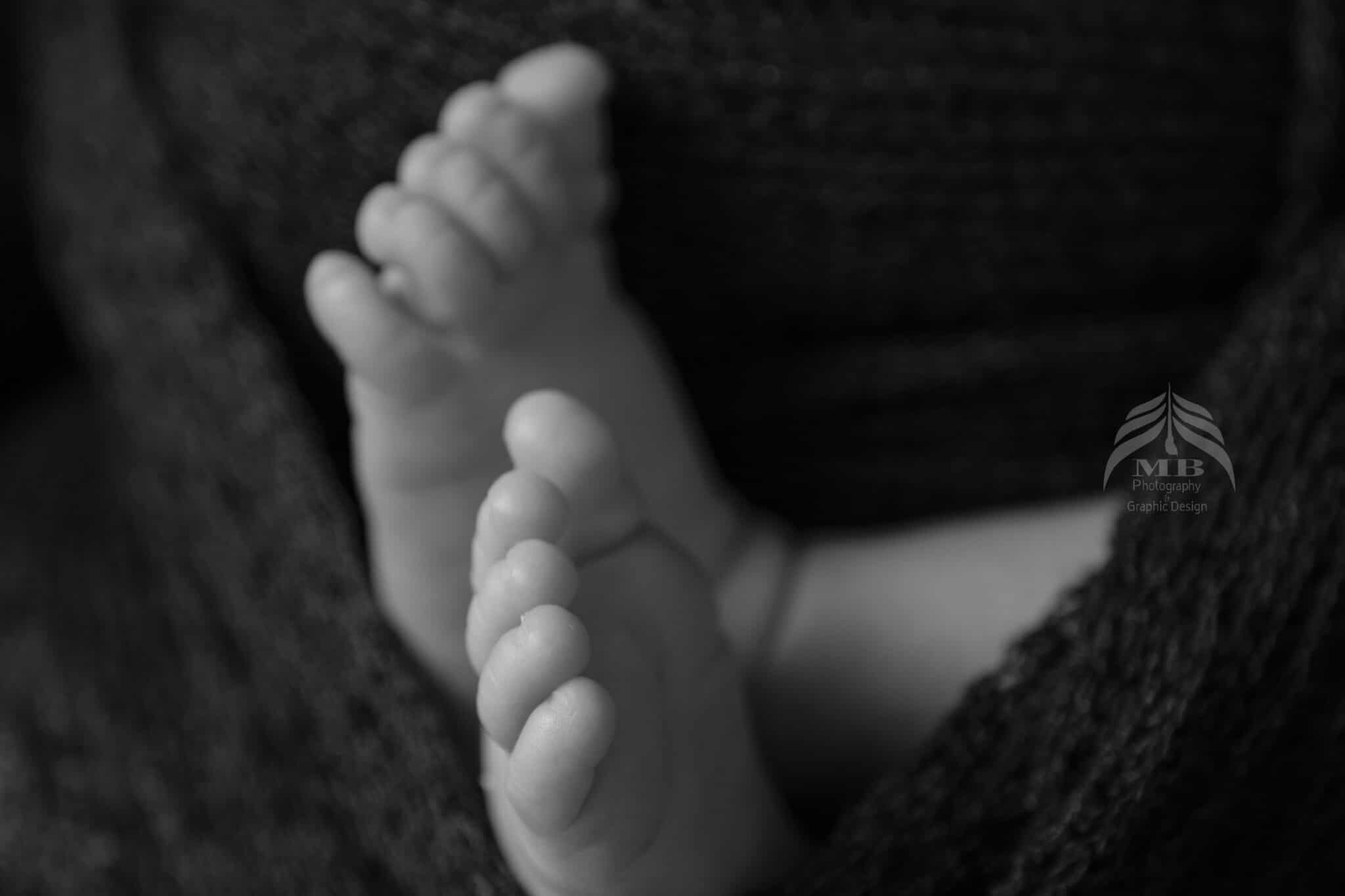 windsor ontario black white newborn baby feet detail Mariam Cheaitou Bazzi