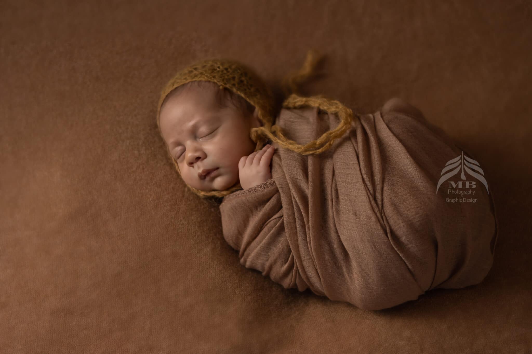 windsor ontario swaddled newborn baby brown bonnet photography Mariam Cheaitou Bazzi