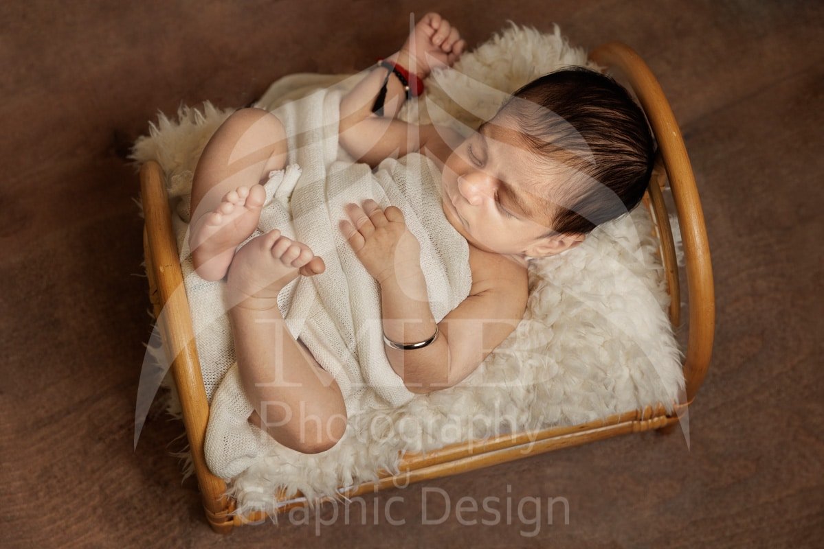 windsor ontario newborn baby wooden bed prop photography Mariam Cheaitou Bazzi