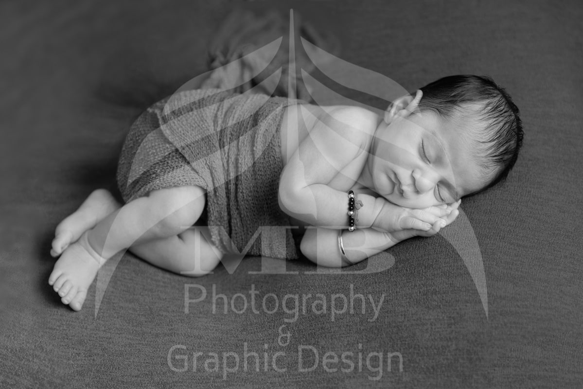 windsor ontario newborn photographer black and white newborn hands folded Mariam Cheaitou Bazzi